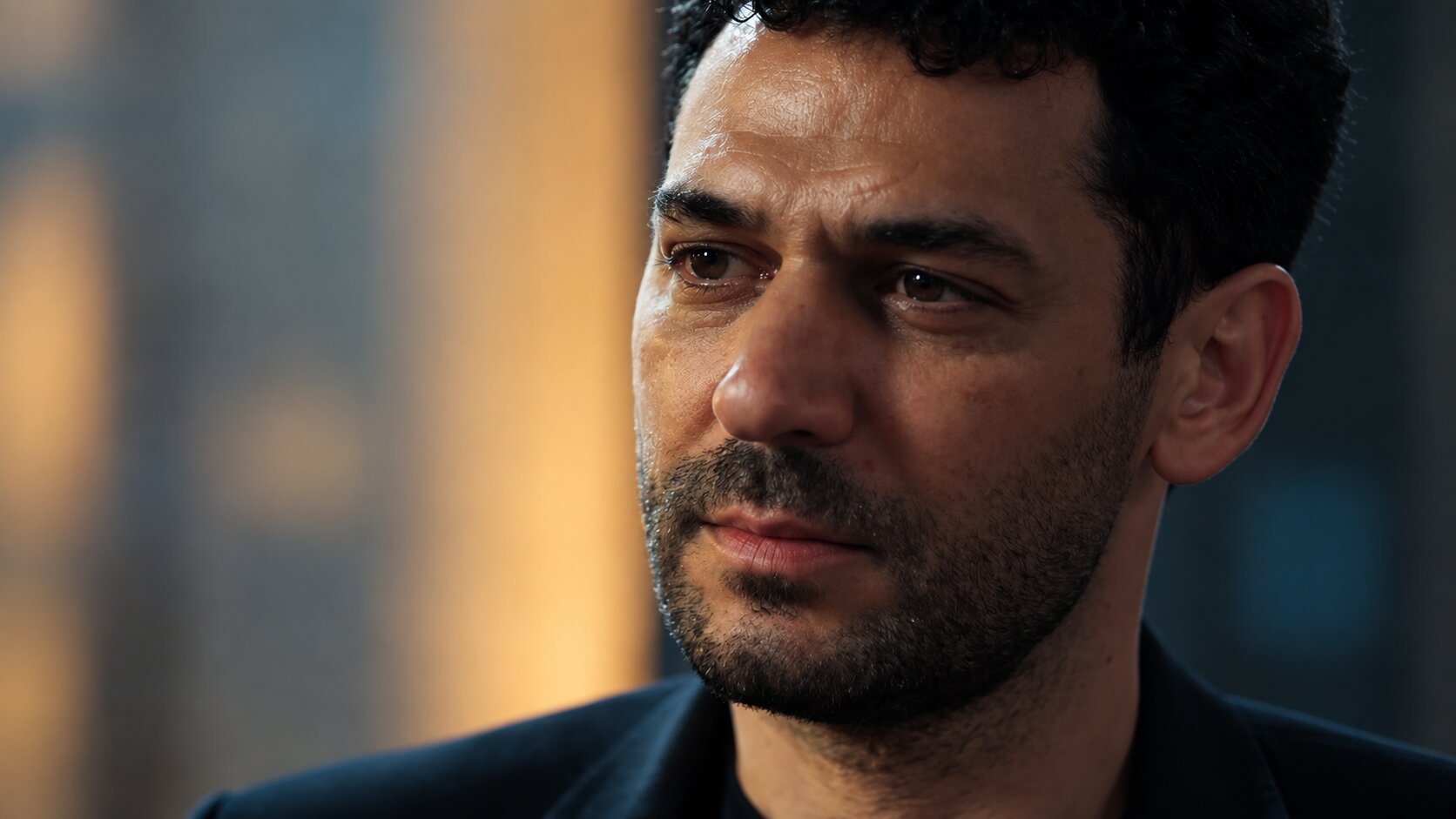 Close-up dramatic portrait of Murat Yıldırım as a somber and emotional Serhat Tecer in Sins and Roses Season 2 (Güller ve Günahlar).