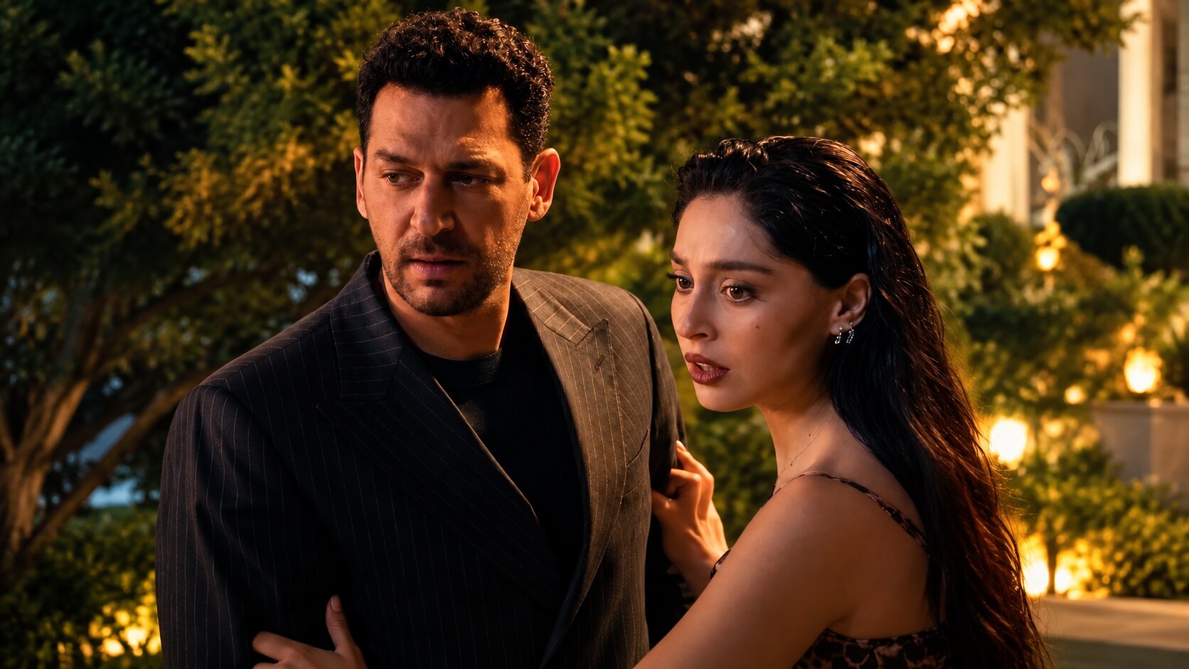 Murat Yıldırım as Serhat Tecer and Cemre Baysel as Zeynep Candan looking surprised to the side in Sins and Roses Season 2 (Güller ve Günahlar).